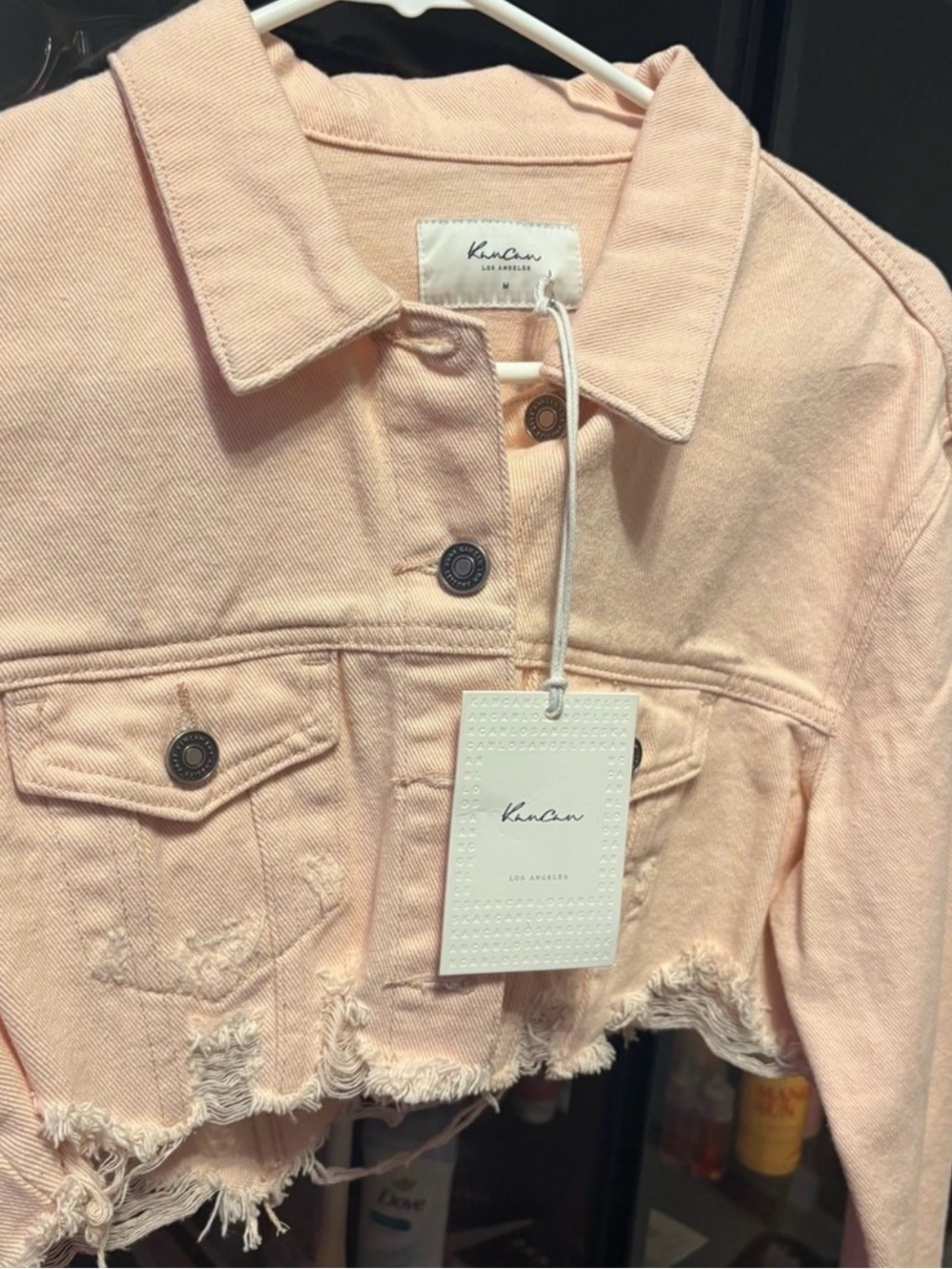 KanCan Pale Pink Cropped Distressed Denim Jacket